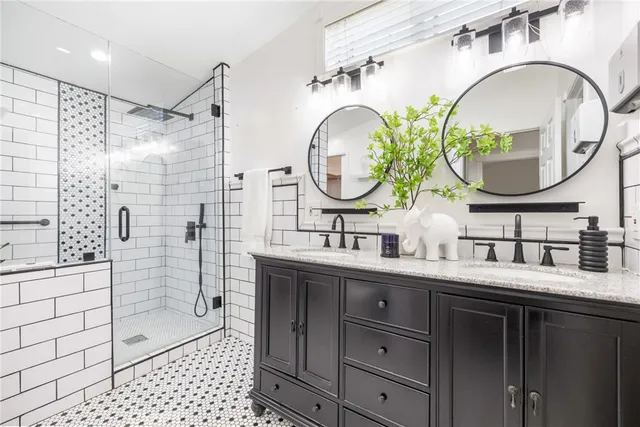 a bedroom with a bed and a potted plant