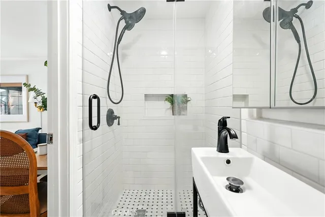 a view of a patio with table and chairs and potted plants