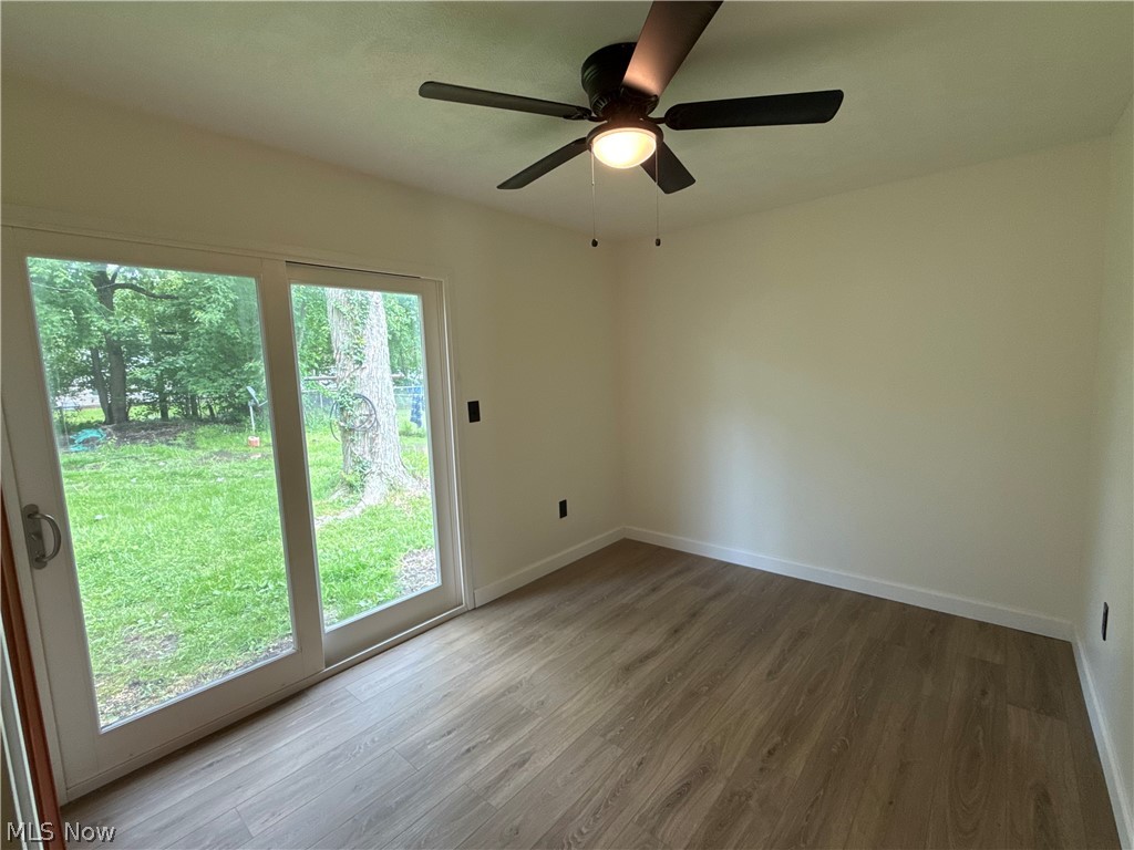 4841 Marigold Road Mentor, OH 44060 - Photo 5 of 12 Interior room with wood-finish flooring and light-toned walls