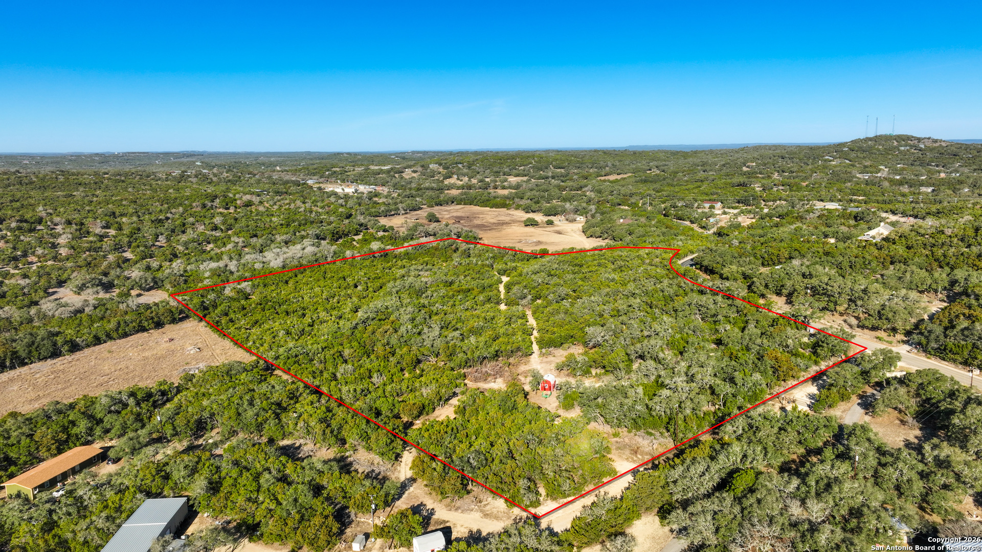 1515 Old Boerne Road Bulverde, TX 78163 - Photo 2 of 21 an aerial view of residential houses with outdoor space