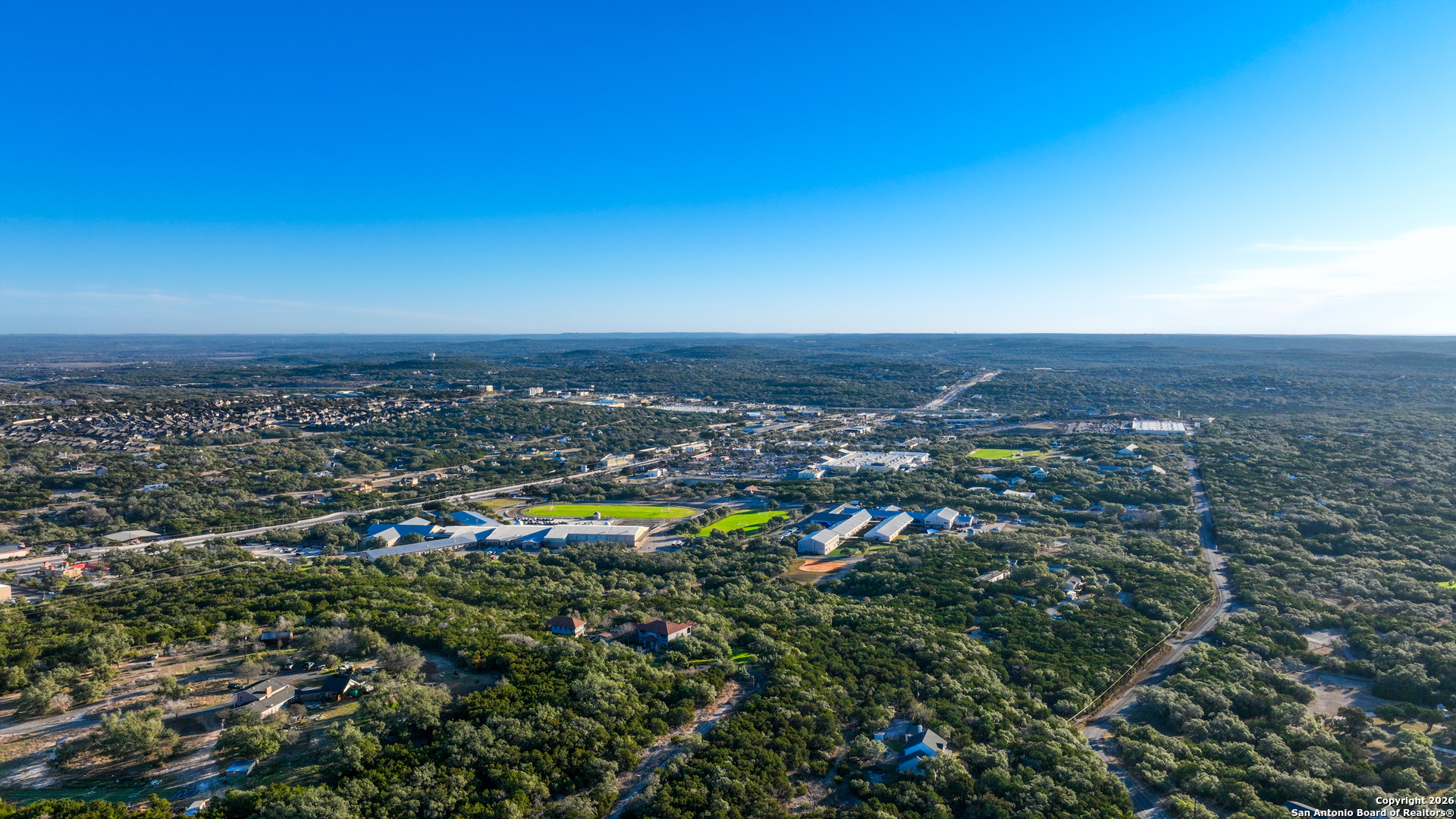 1515 Old Boerne Road Bulverde, TX 78163 - Photo 3 of 21 an aerial view of a houses with a swimming pool