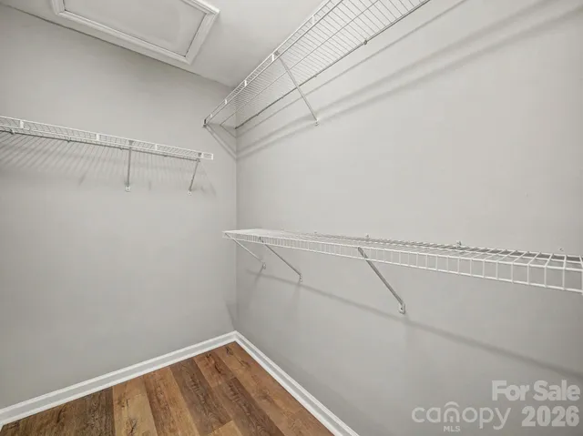 a view of a room with racks on the wall