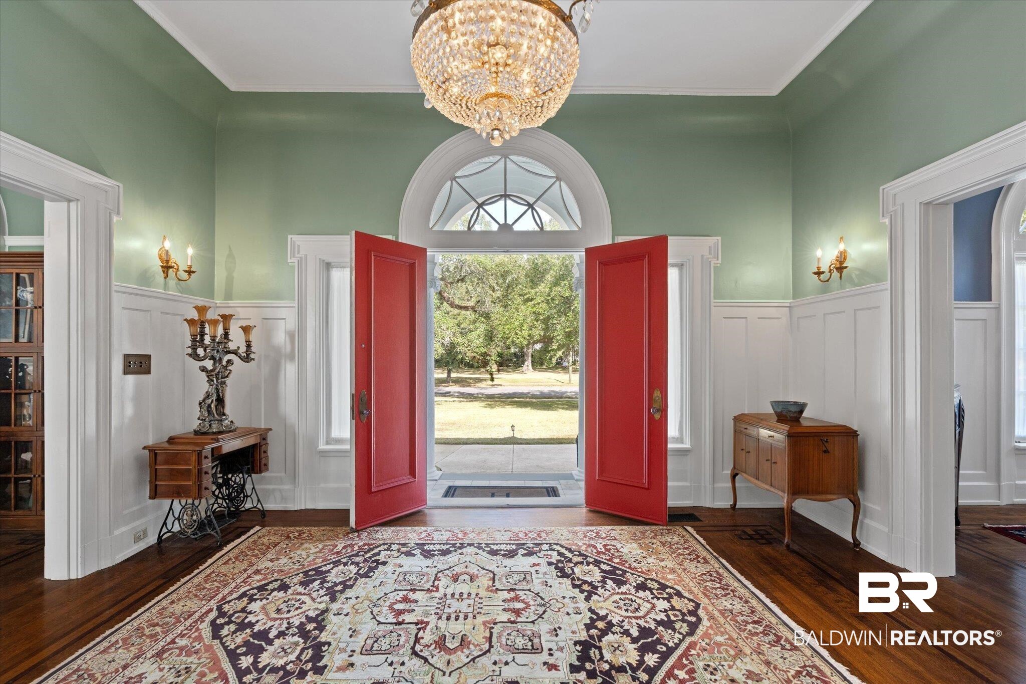 1953 Dauphin Street Mobile, AL 36606 - Photo 3 of 56 Entryway with dark wood-type flooring, crown molding, and plenty of natural light