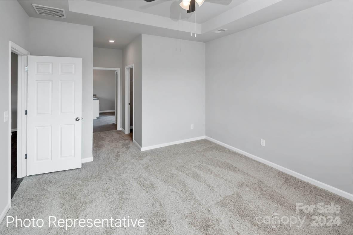 135 Dandelion Road Fletcher, NC 28732 - Photo 9 of 20 an empty room with a bathroom and a shower