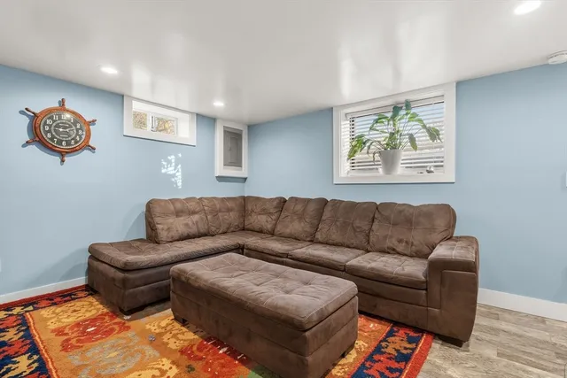 a living room with furniture and a couch