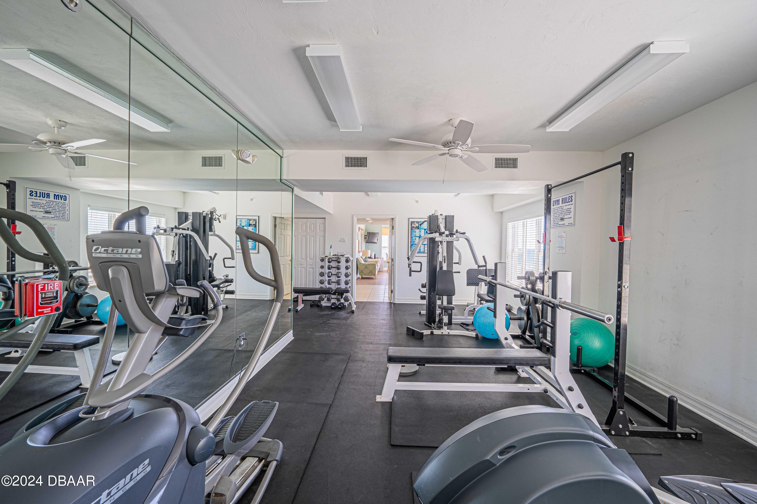 4767 South Atlantic Avenue, Unit 204 Ponce Inlet, FL 32127 - Photo 19 of 26 a view of a room with gym equipment