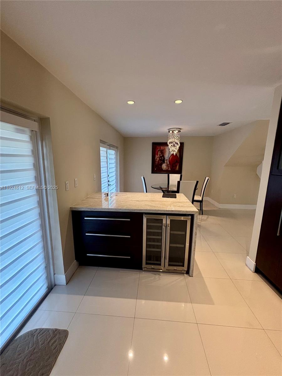 13765 Southwest 160th Terrace Miami, FL 33177 - Photo 12 of 47 a room with a dresser and a mirror