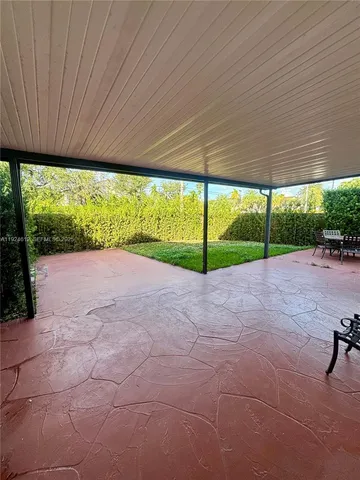 a view of a backyard of a house