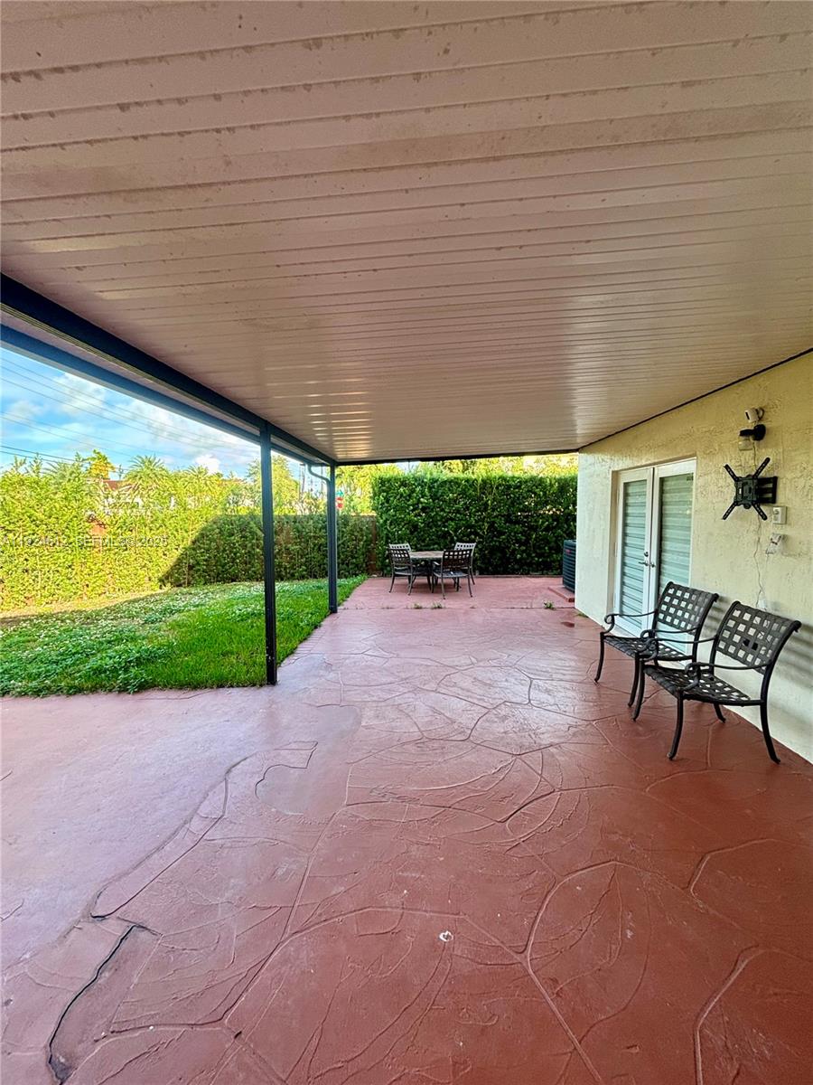 13765 Southwest 160th Terrace Miami, FL 33177 - Photo 17 of 47 a view of a backyard with sitting area
