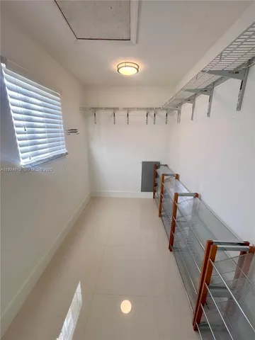 a view of a room with windows