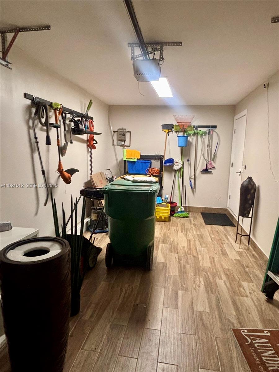 13765 Southwest 160th Terrace Miami, FL 33177 - Photo 39 of 47 a view of a dining room with furniture and a flat screen tv