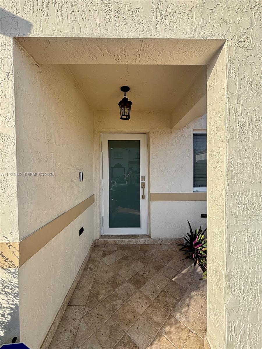 13765 Southwest 160th Terrace Miami, FL 33177 - Photo 44 of 47 a view of a entryway