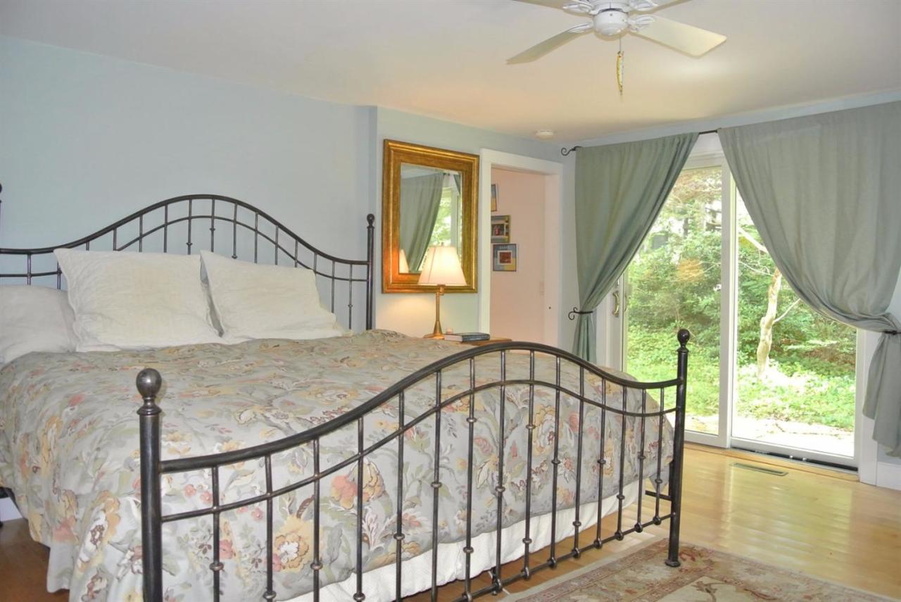 83 Summersea Road Mashpee, MA 02649 - Photo 12 of 25 a bedroom with a bed and a window