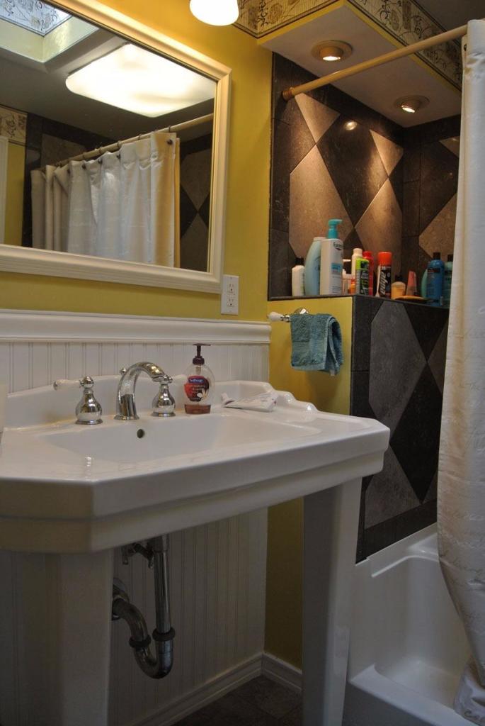 83 Summersea Road Mashpee, MA 02649 - Photo 15 of 25 a bathroom with a sink and a mirror