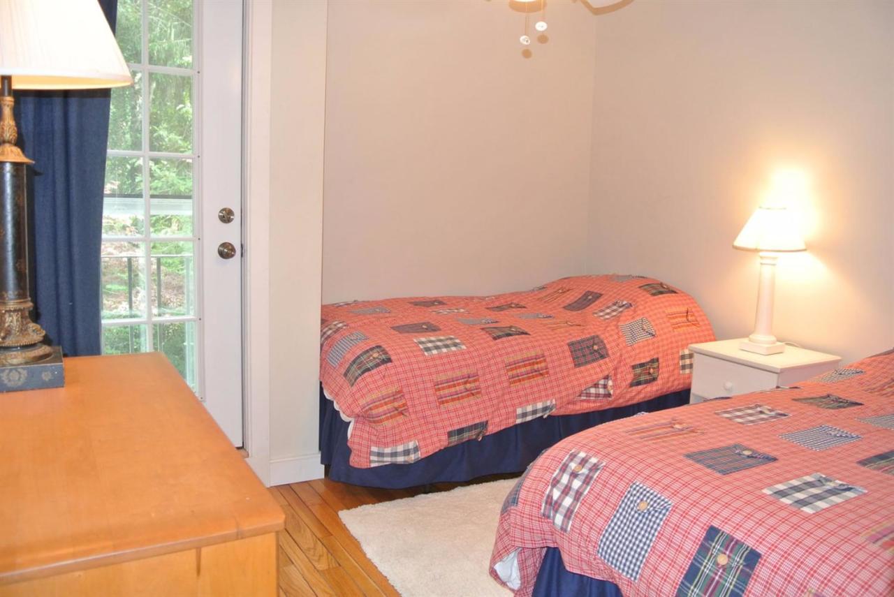 83 Summersea Road Mashpee, MA 02649 - Photo 16 of 25 a bedroom with two beds and a window