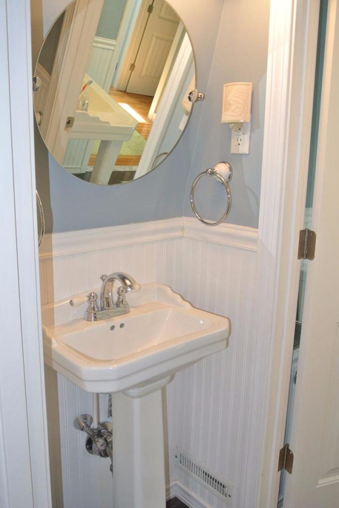 83 Summersea Road Mashpee, MA 02649 - Photo 18 of 25 a bathroom with a sink a mirror and vanity