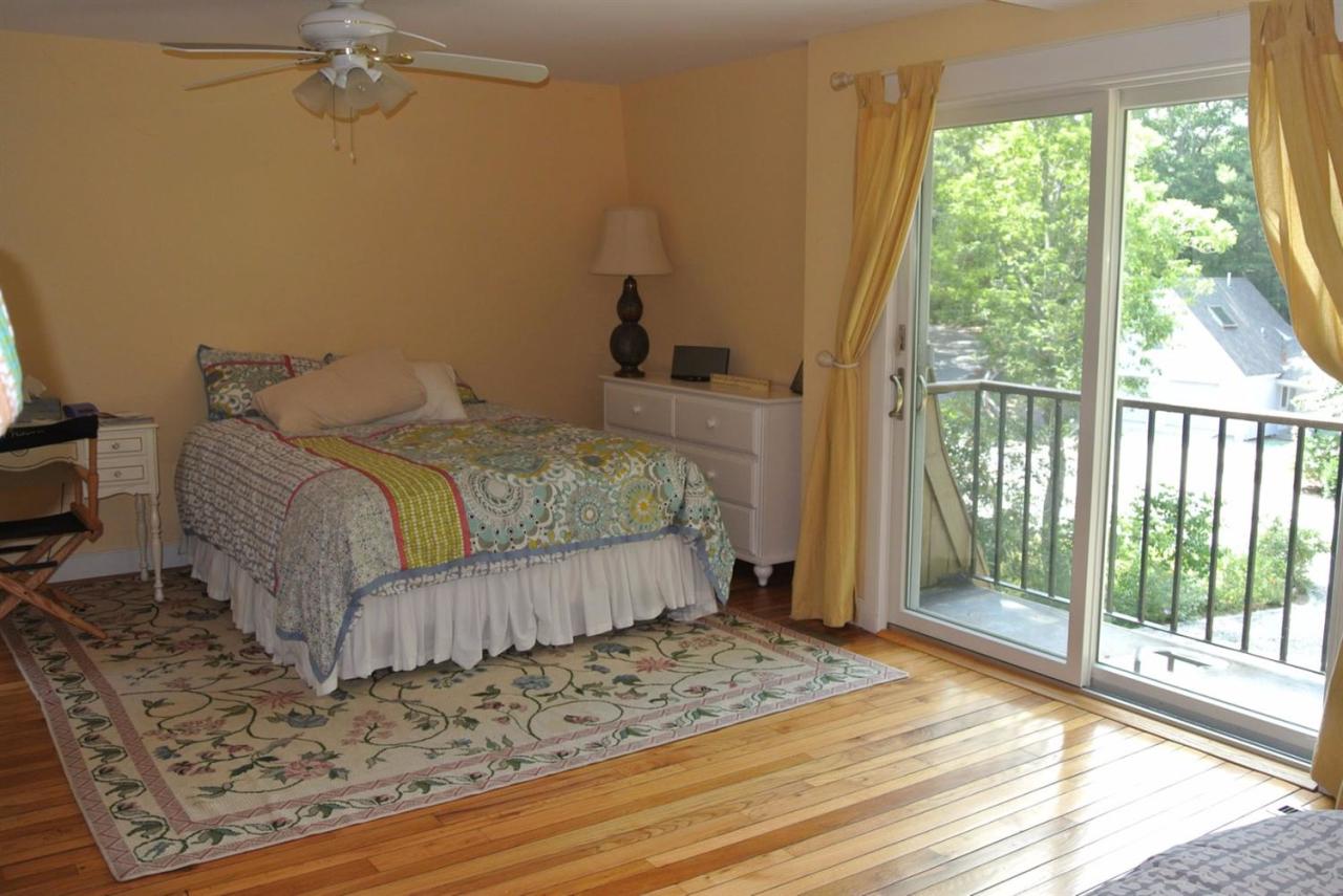83 Summersea Road Mashpee, MA 02649 - Photo 20 of 25 a bedroom with a bed and a window