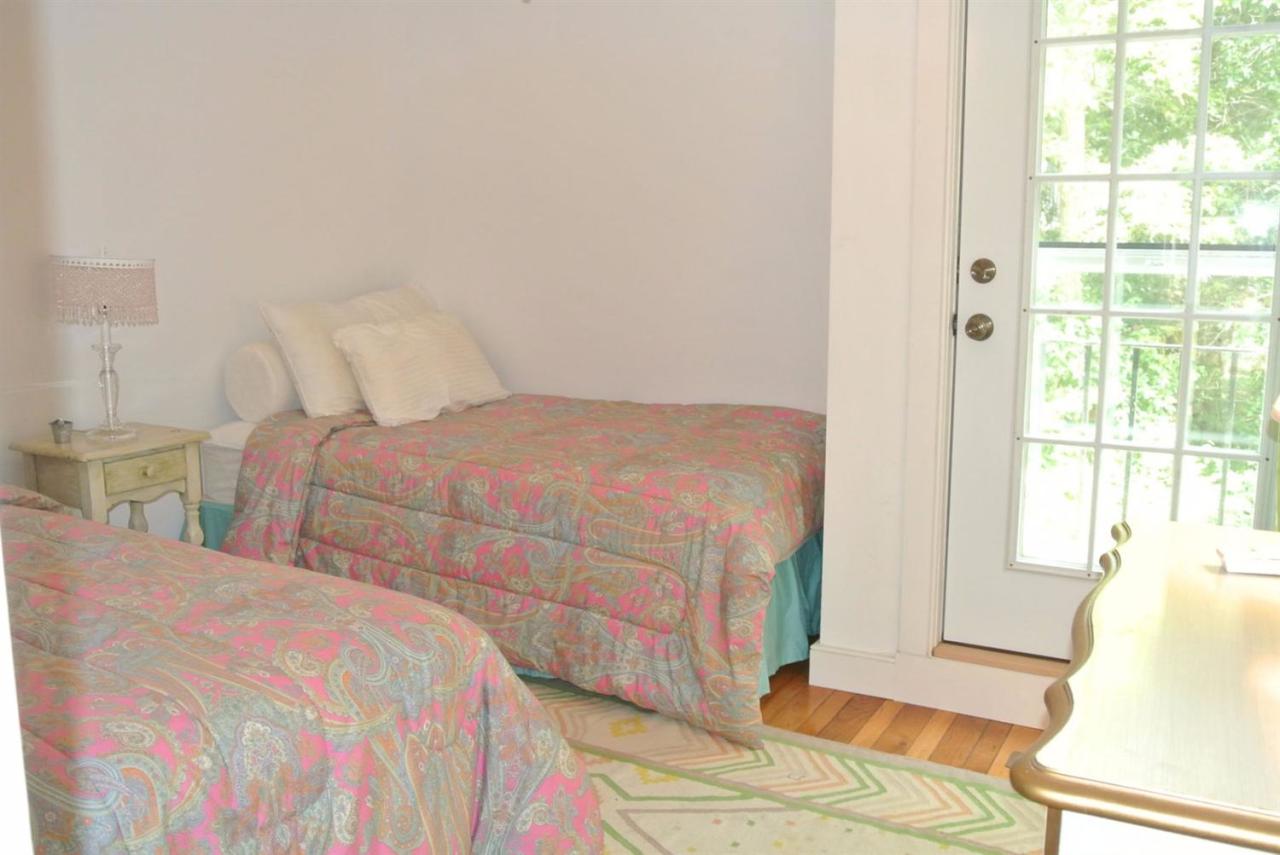 83 Summersea Road Mashpee, MA 02649 - Photo 22 of 25 a bedroom with double bed and a window