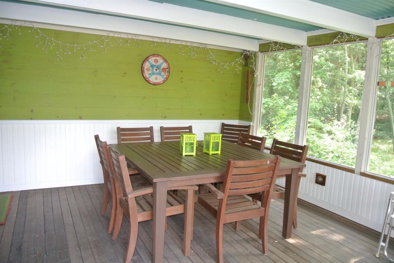 83 Summersea Road Mashpee, MA 02649 - Photo 24 of 25 a view of a dining room with furniture and wooden floor