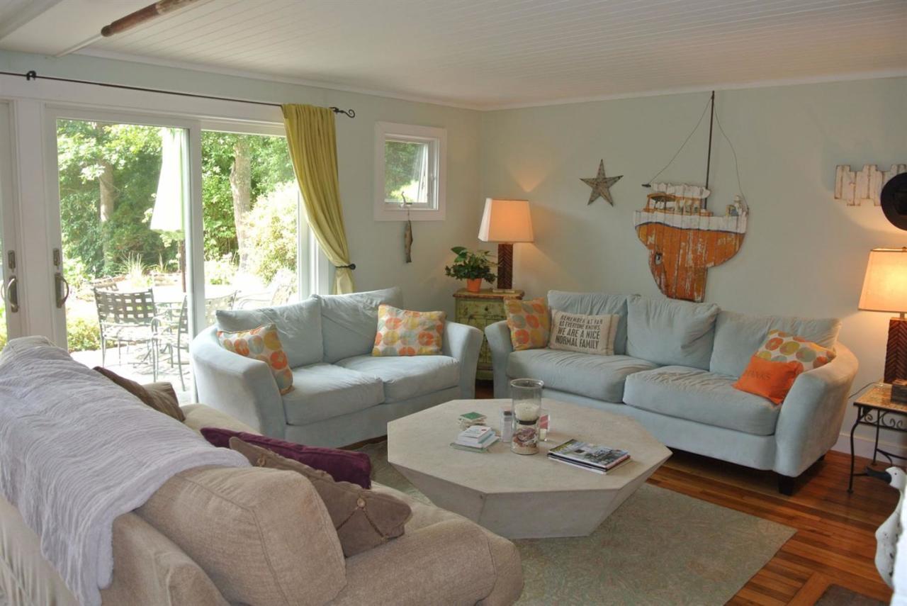 83 Summersea Road Mashpee, MA 02649 - Photo 9 of 25 a living room with furniture and a large window