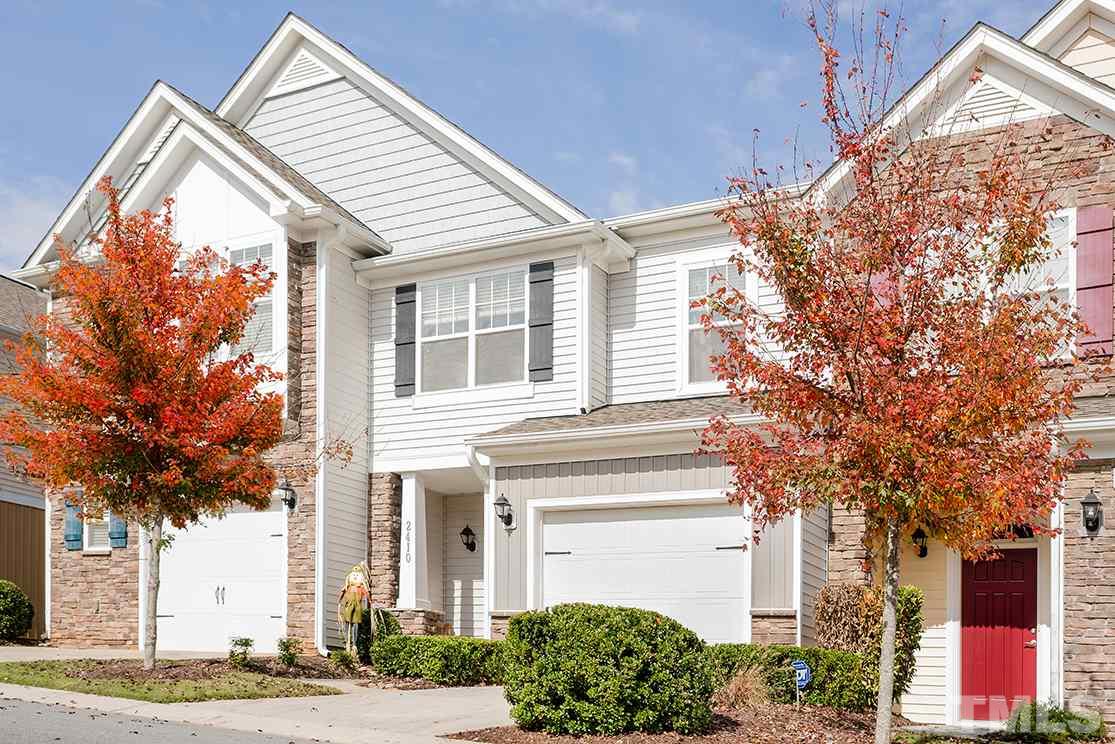 2410 Memory Ridge Drive Raleigh, NC 27606 - Photo 1 of 20 a front view of a house with a yard