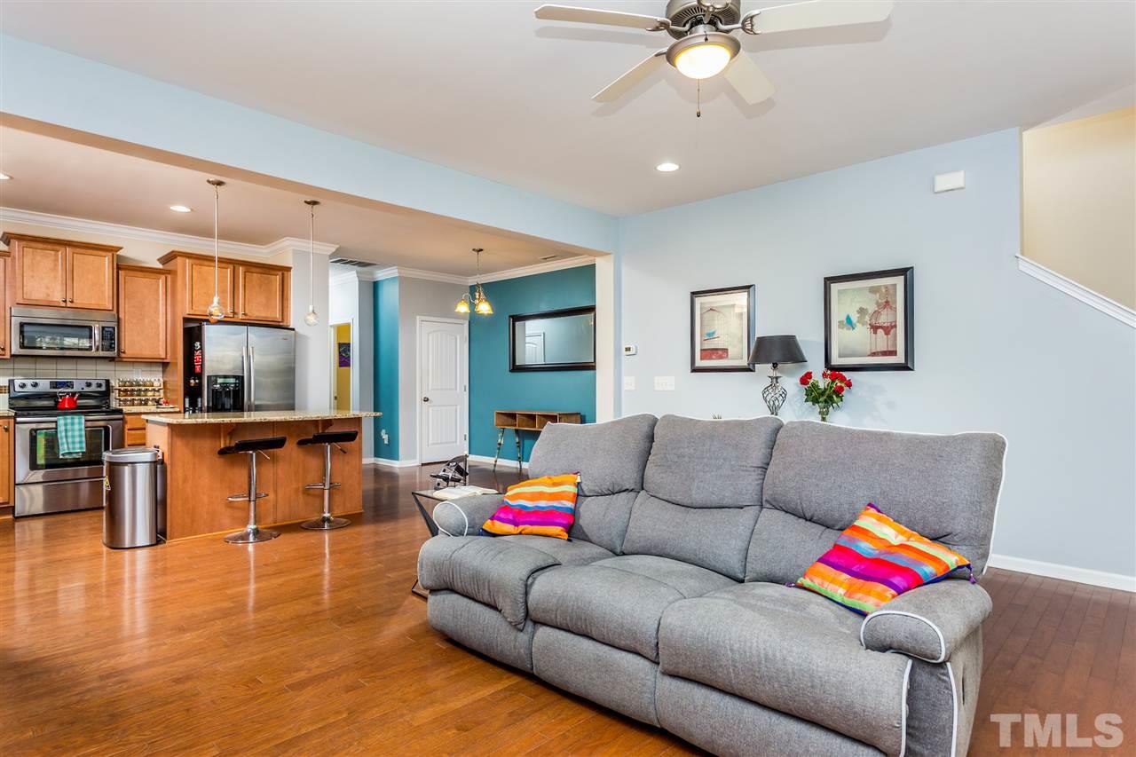 2410 Memory Ridge Drive Raleigh, NC 27606 - Photo 6 of 20 a living room with furniture and kitchen view