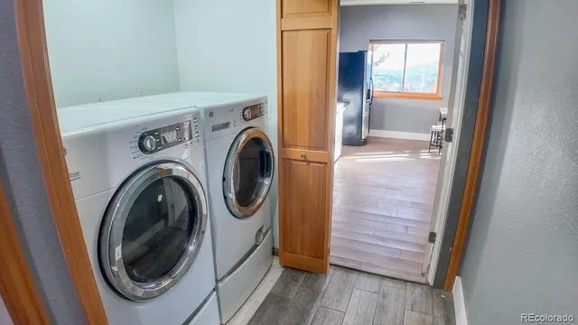 a utility room with dryer and washer