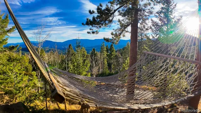 a view of a garden from a balcony