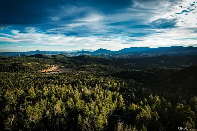 a view of mountain with lake view