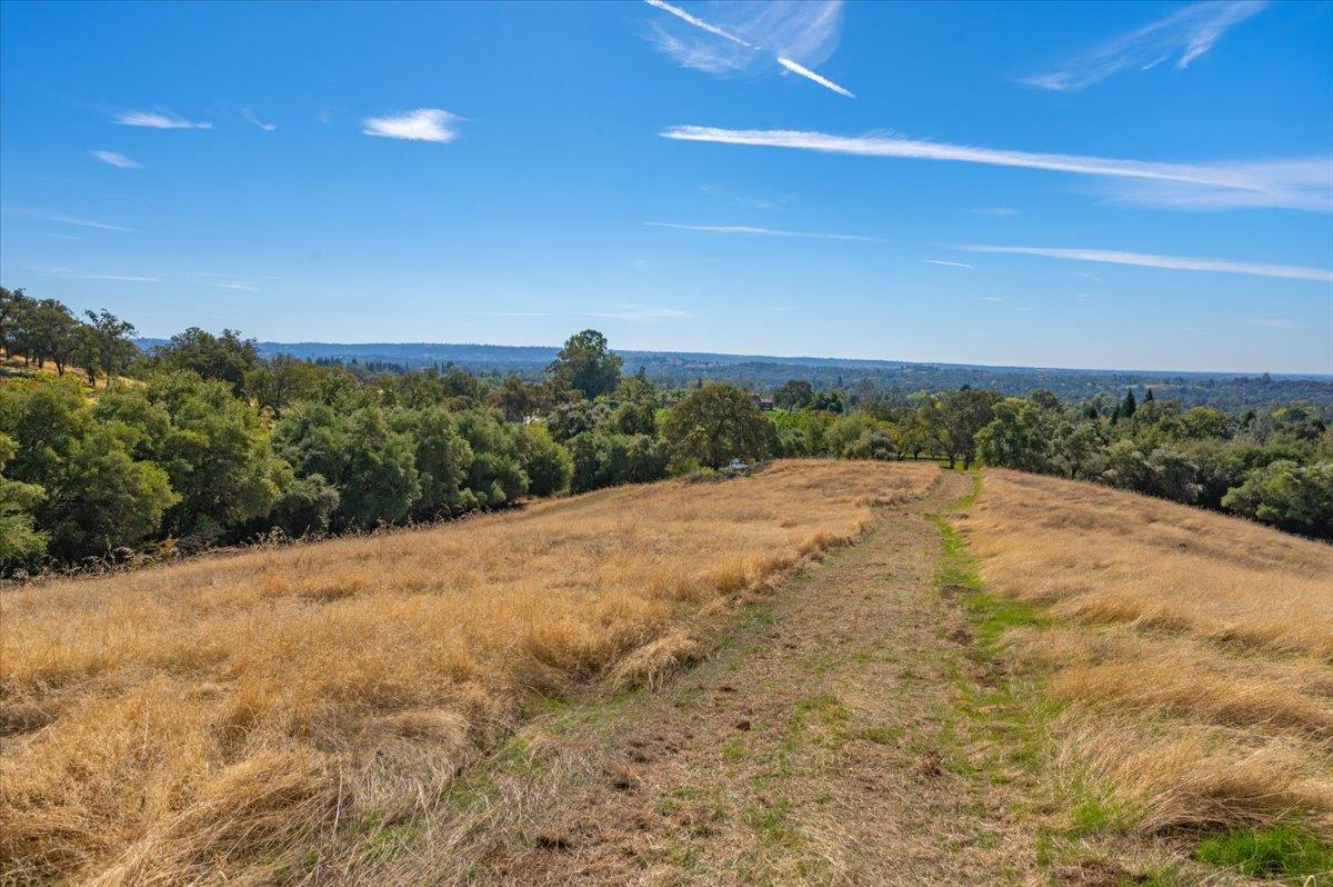 0 Garden Bar Road Lincoln, CA 95648 - Photo 2 of 21 a view of a dry yard with wooden fence