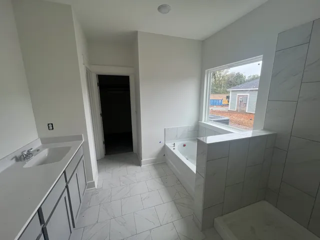 a view of kitchen with furniture and window