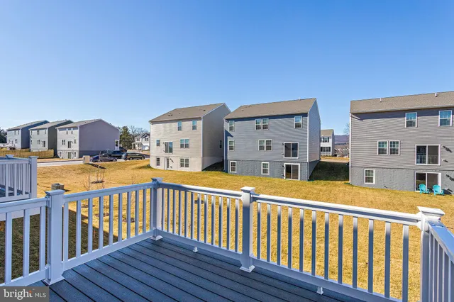 a balcony view with a seating space