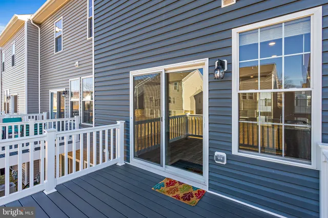 a view of porch with wooden floor