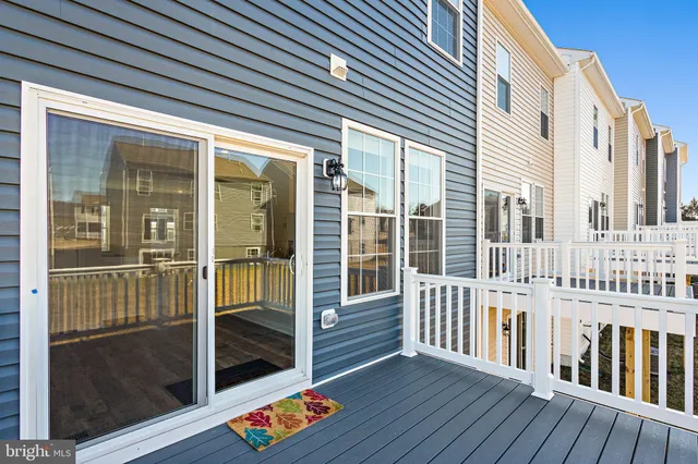 a view of porch with a lounge chair