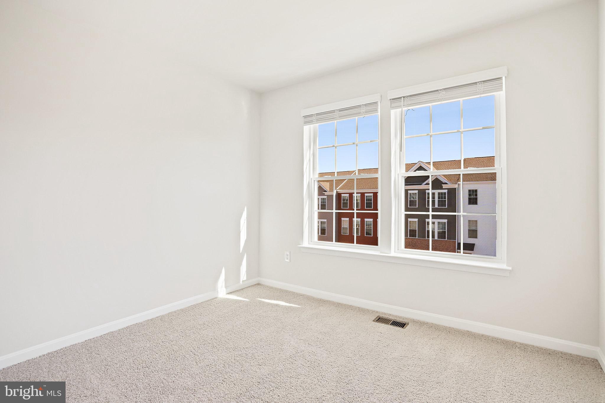 1271 Apollo Drive Frederick, MD 21702 - Photo 28 of 42 a view of an empty room with a window