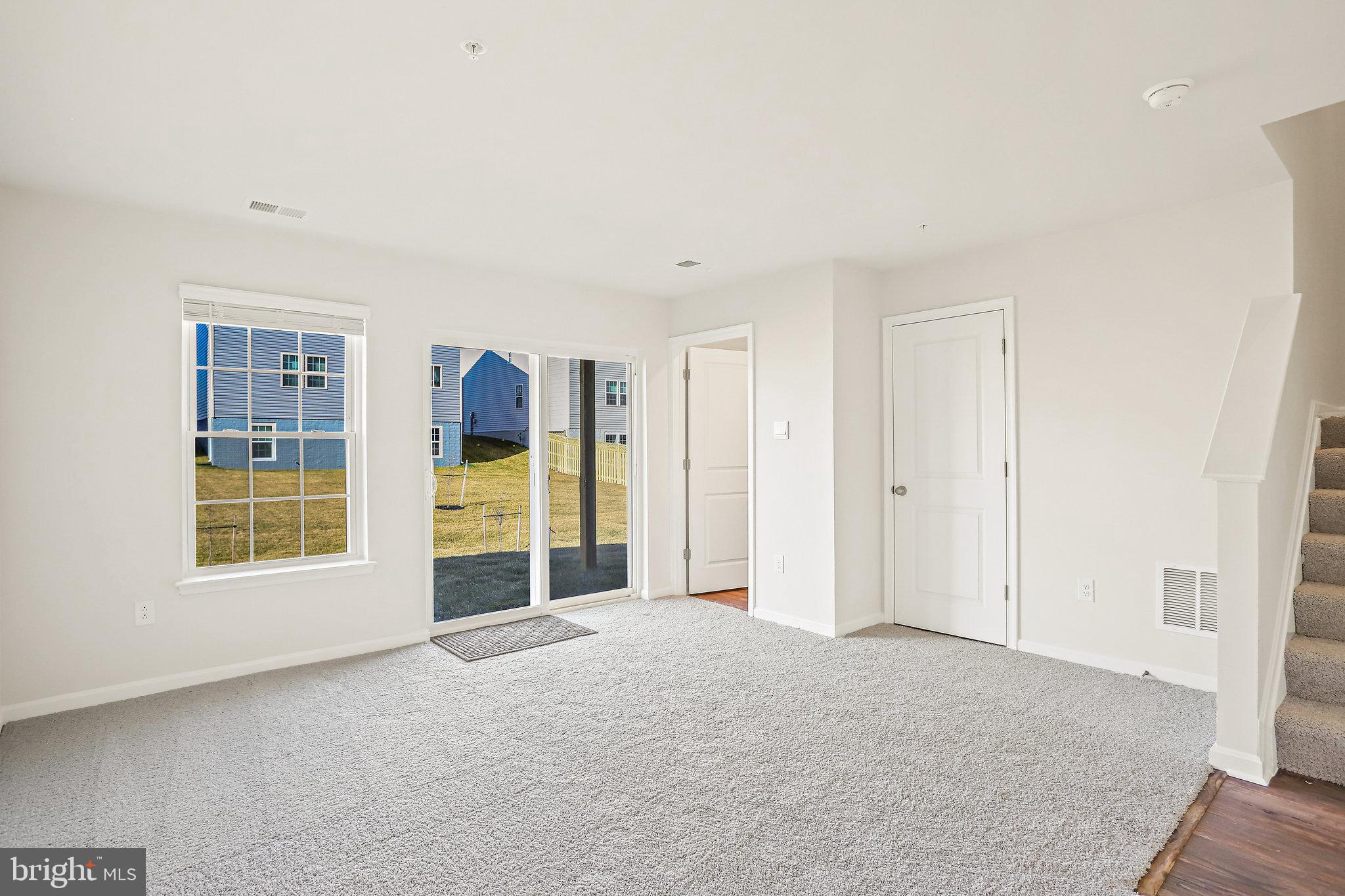 1271 Apollo Drive Frederick, MD 21702 - Photo 34 of 42 an empty room with windows and closet