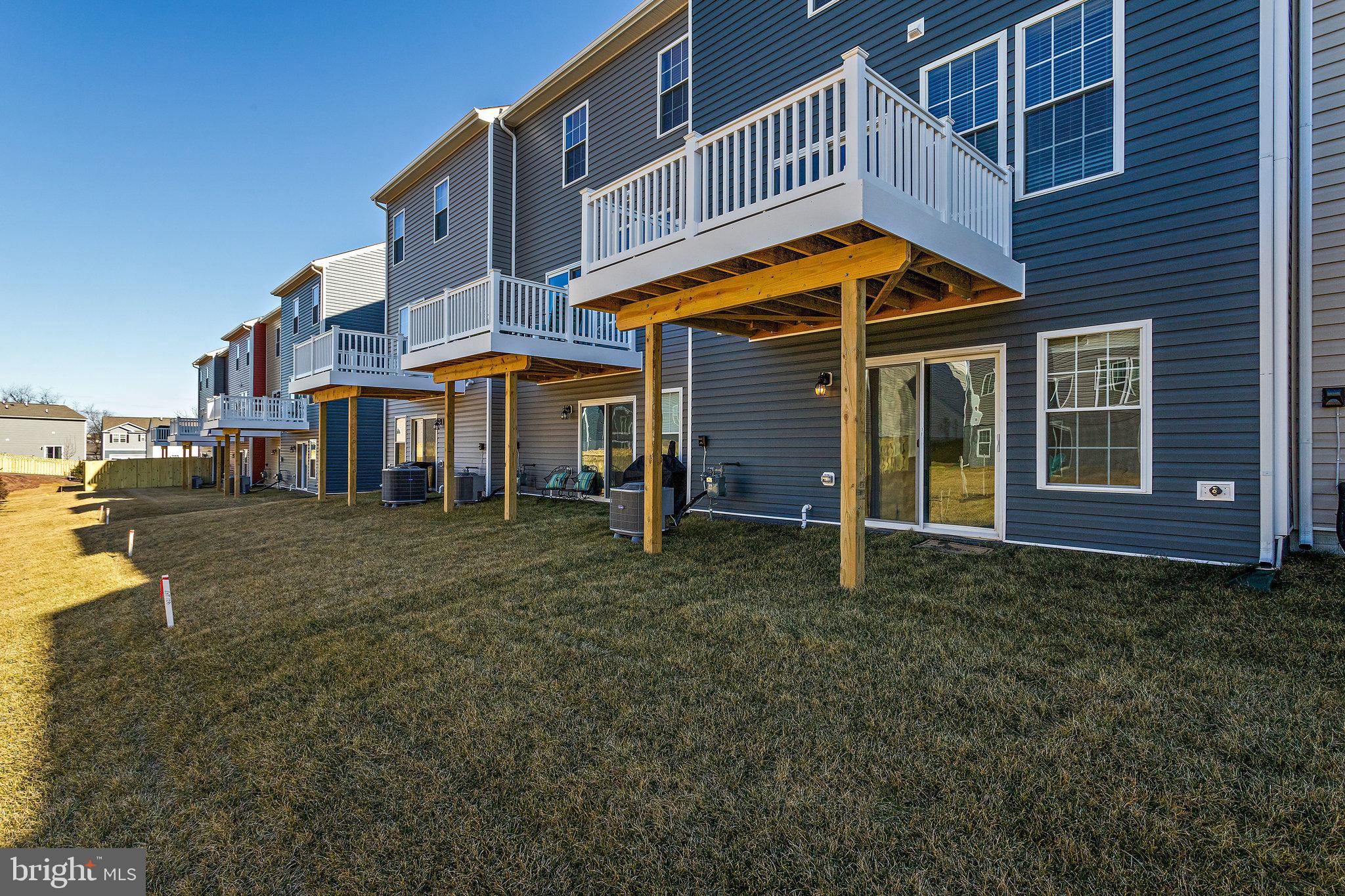 1271 Apollo Drive Frederick, MD 21702 - Photo 40 of 42 a view of a house with a yard