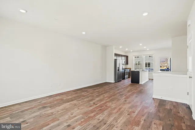 a view of kitchen with wooden floor