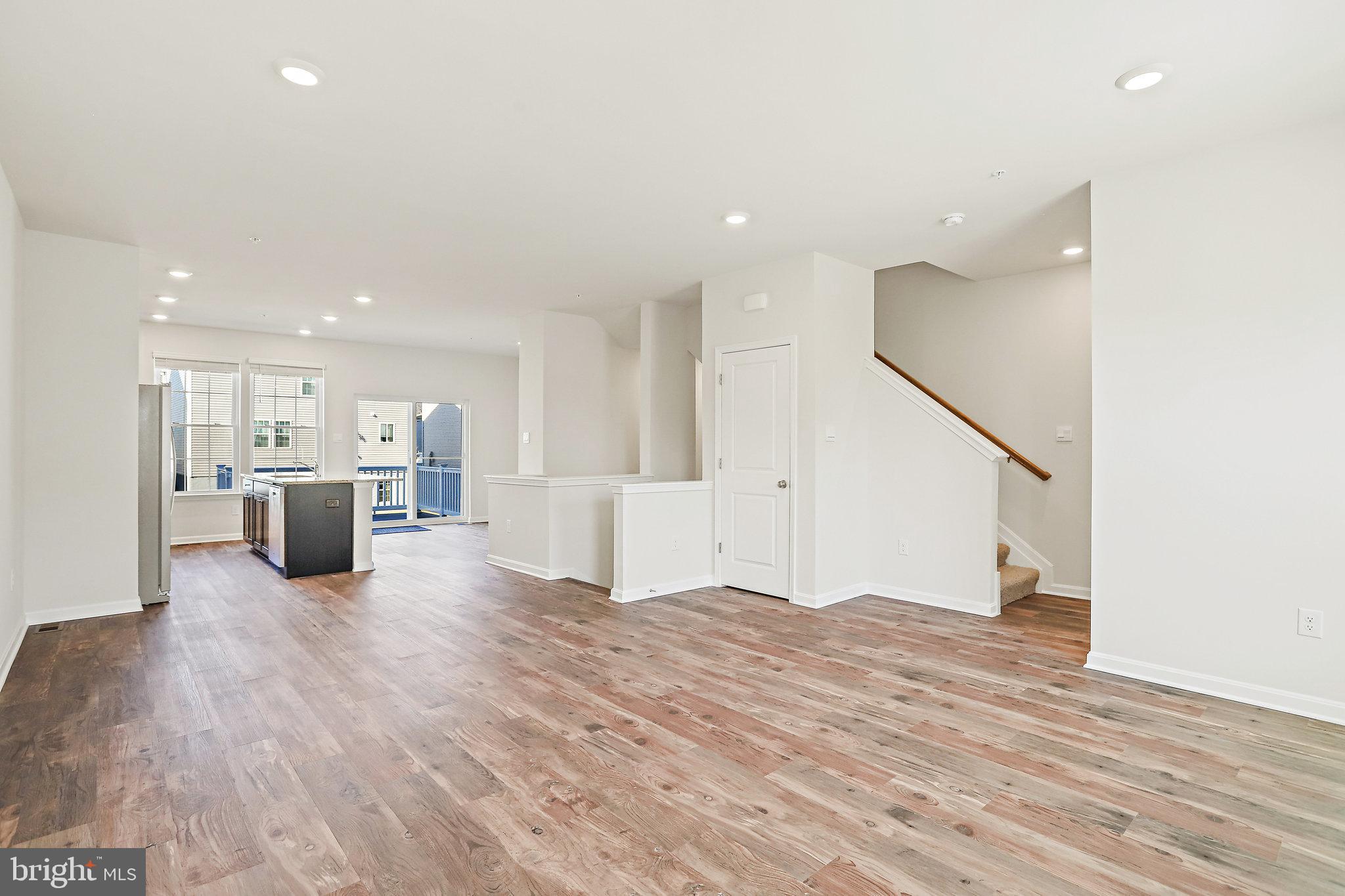 1271 Apollo Drive Frederick, MD 21702 - Photo 8 of 42 a view of a kitchen with a sink and a refrigerator