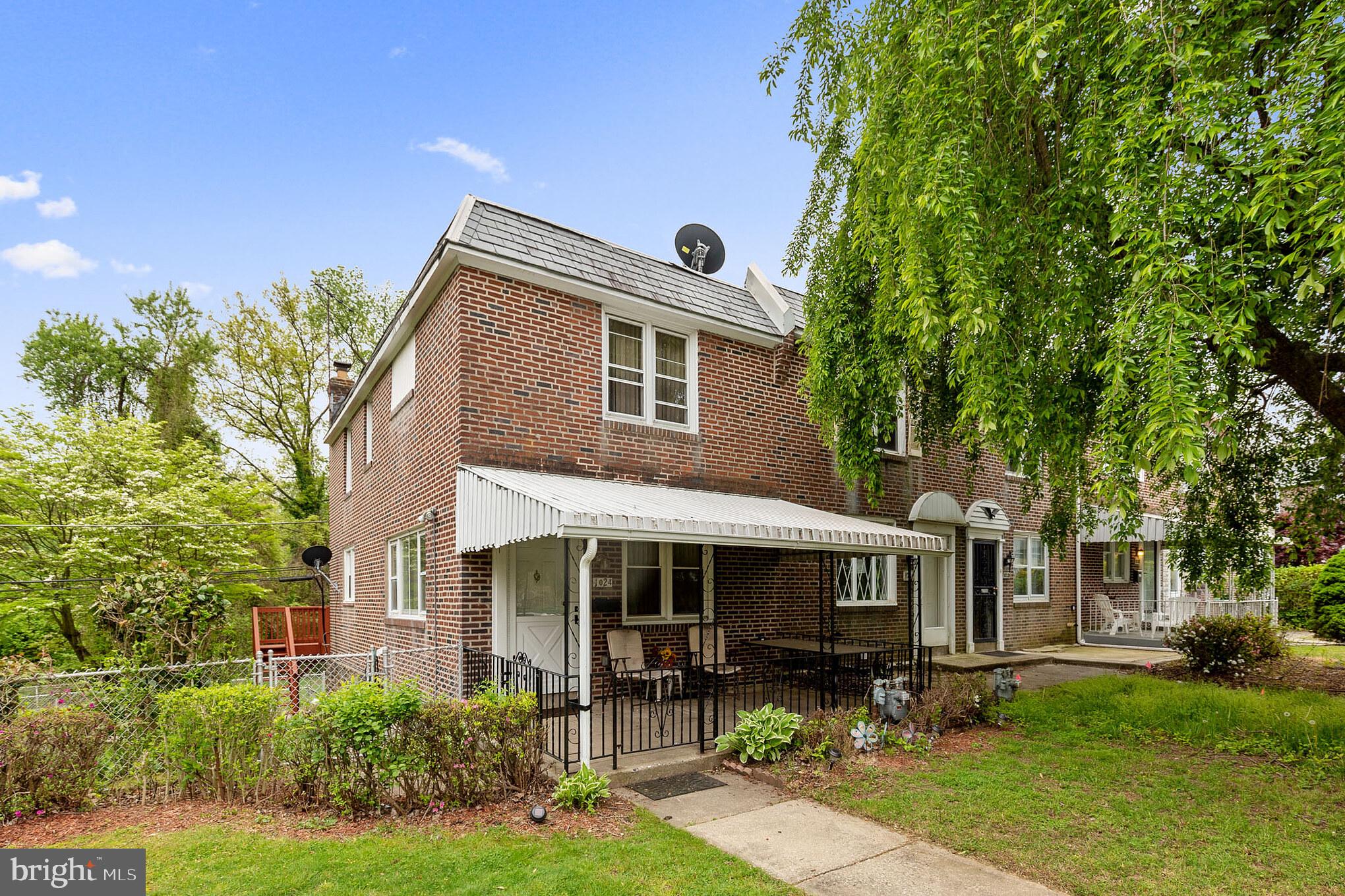 1024 South Lynbrook Road Darby, PA 19023 - Photo 1 of 29 a front view of house with yard and green space