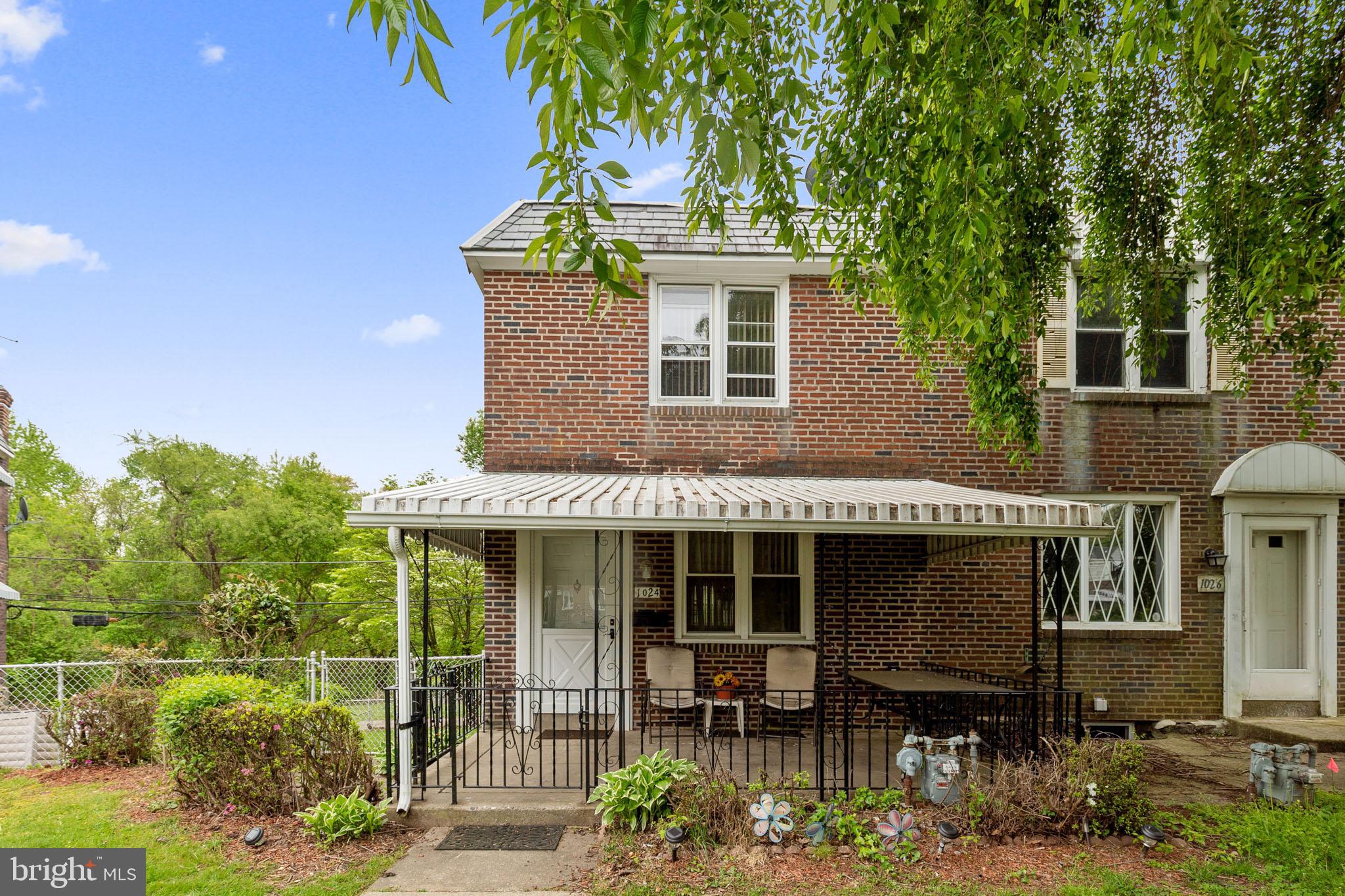 1024 South Lynbrook Road Darby, PA 19023 - Photo 2 of 29 a front view of a house with a porch