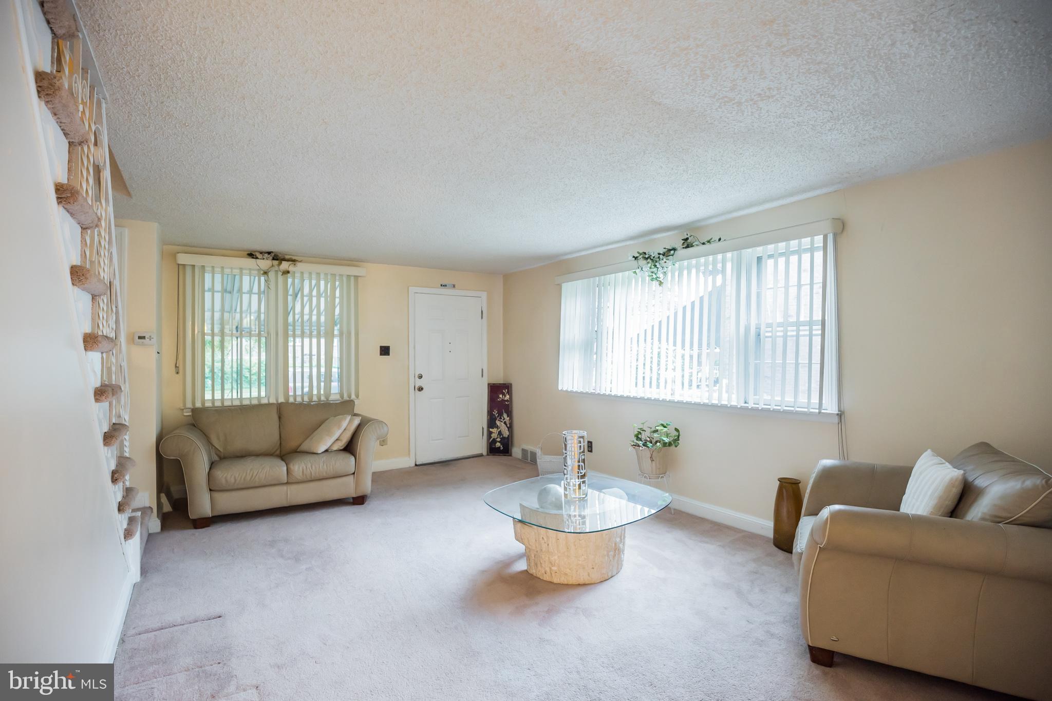 1024 South Lynbrook Road Darby, PA 19023 - Photo 3 of 29 a living room with furniture and window
