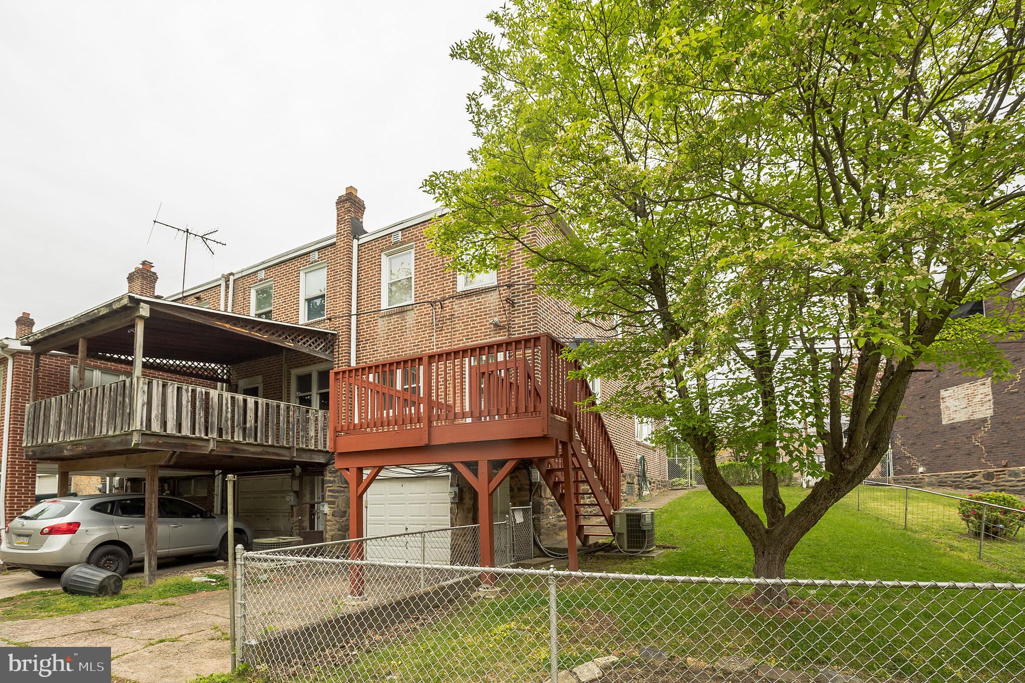 1024 South Lynbrook Road Darby, PA 19023 - Photo 25 of 29 a front view of a house with garden