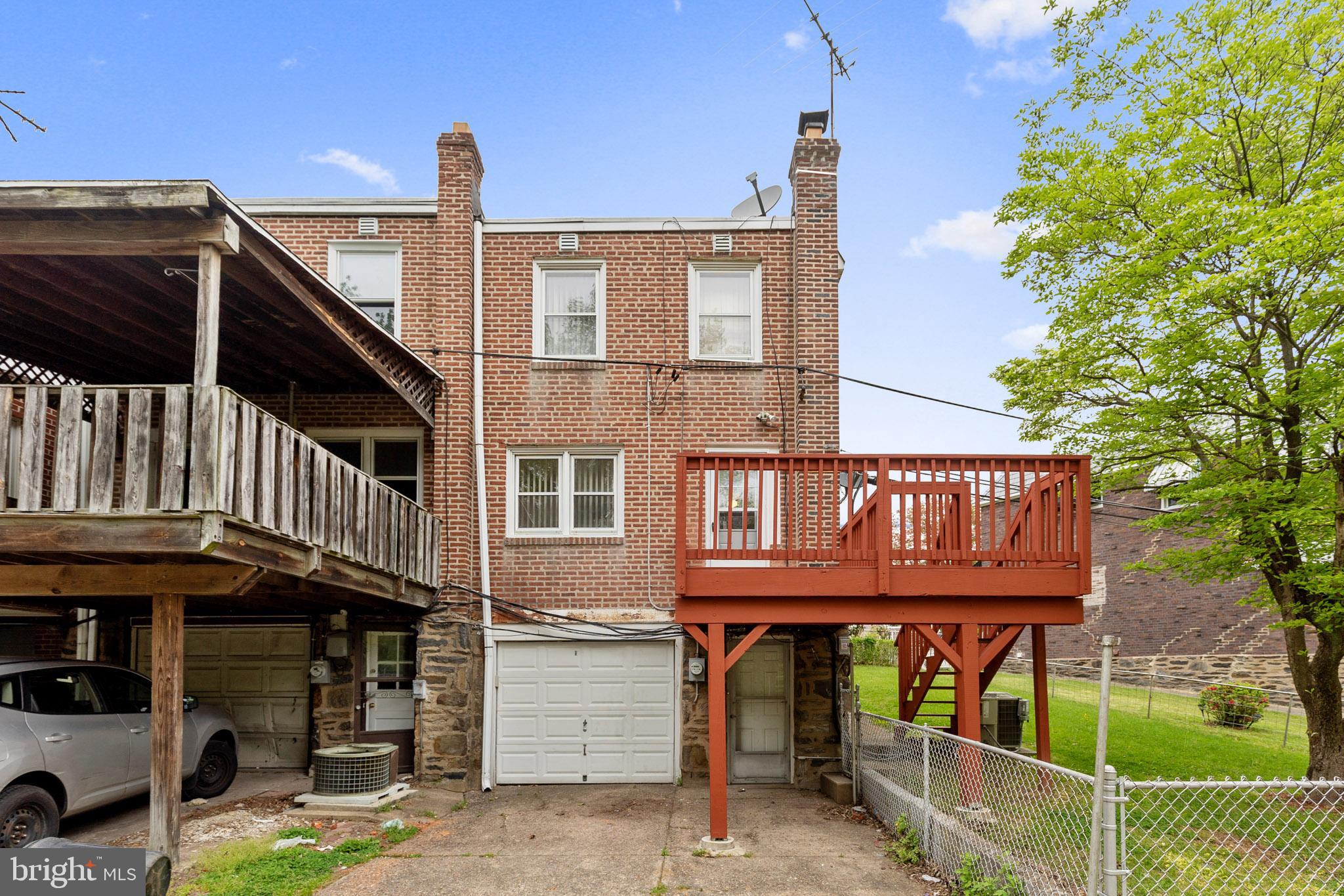 1024 South Lynbrook Road Darby, PA 19023 - Photo 26 of 29 a view of a brick house with large windows