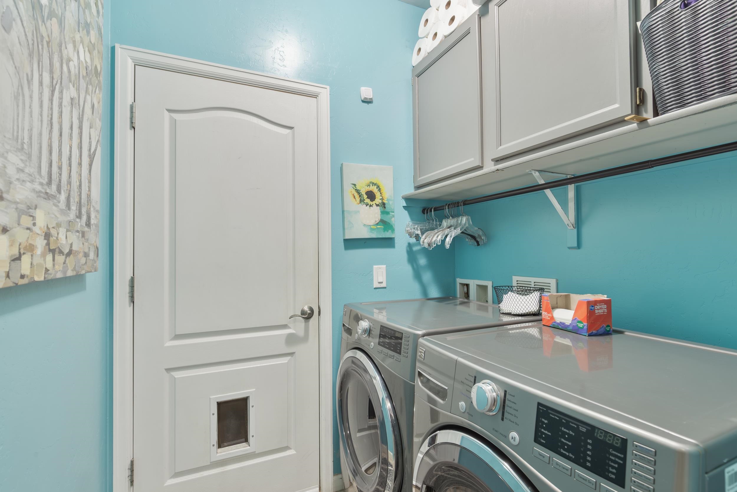 3033 Prairie View Drive Grand Junction, CO 81504 - Photo 13 of 32 a utility room with dryer and washer
