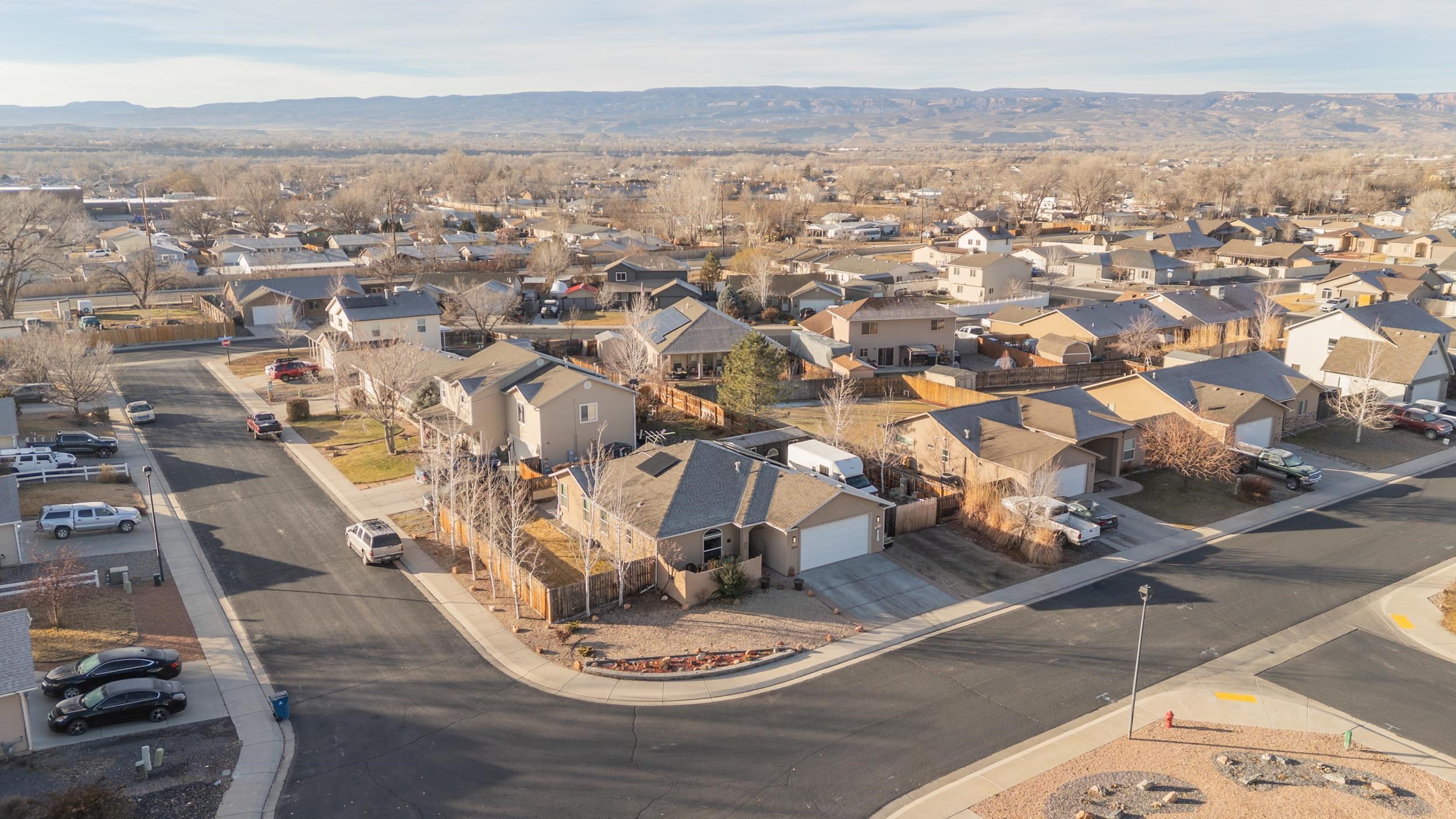 3033 Prairie View Drive Grand Junction, CO 81504 - Photo 30 of 32 an aerial view of residential houses with outdoor space