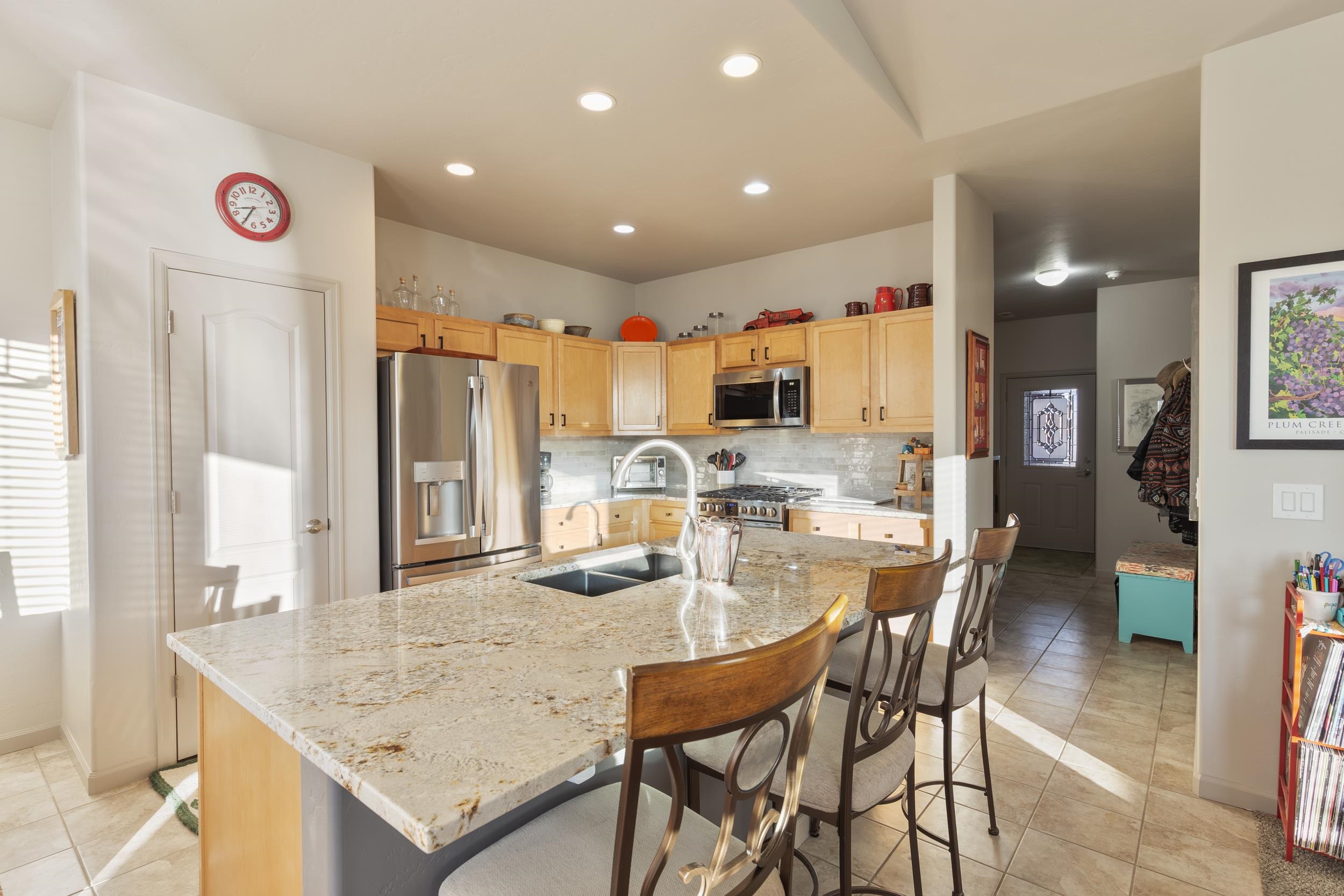 3033 Prairie View Drive Grand Junction, CO 81504 - Photo 7 of 32 a view of kitchen with cabinets and wooden floor