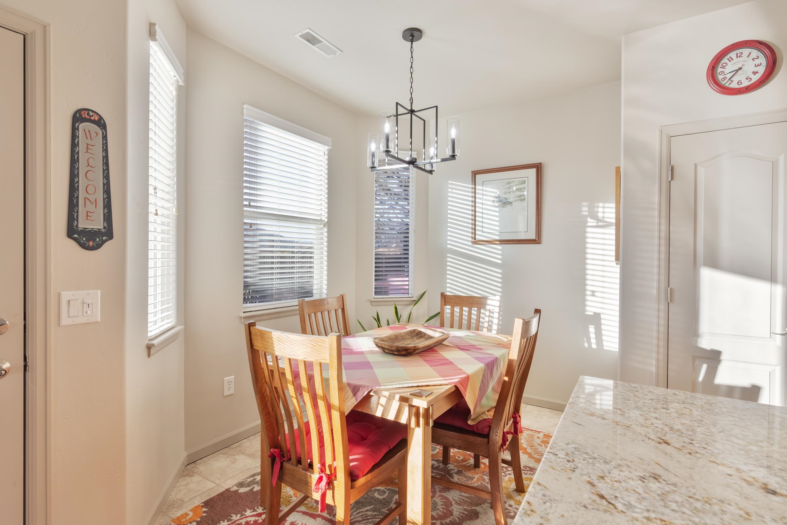 3033 Prairie View Drive Grand Junction, CO 81504 - Photo 9 of 32 a view of a dining room with furniture window and outside view