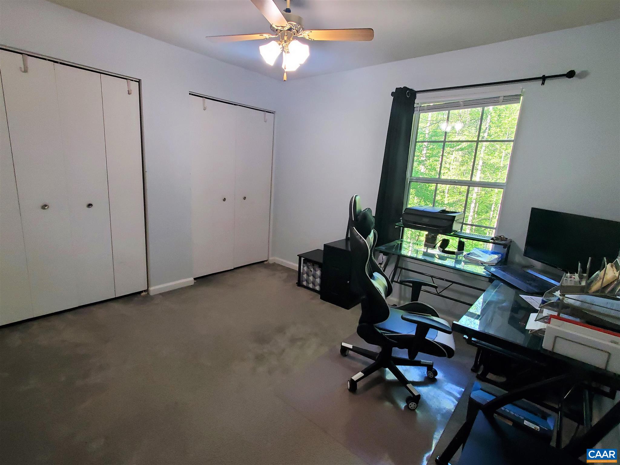 583 Jonquil Road Ruckersville, VA 22968 - Photo 6 of 14 a view of a workspace with furniture and a window