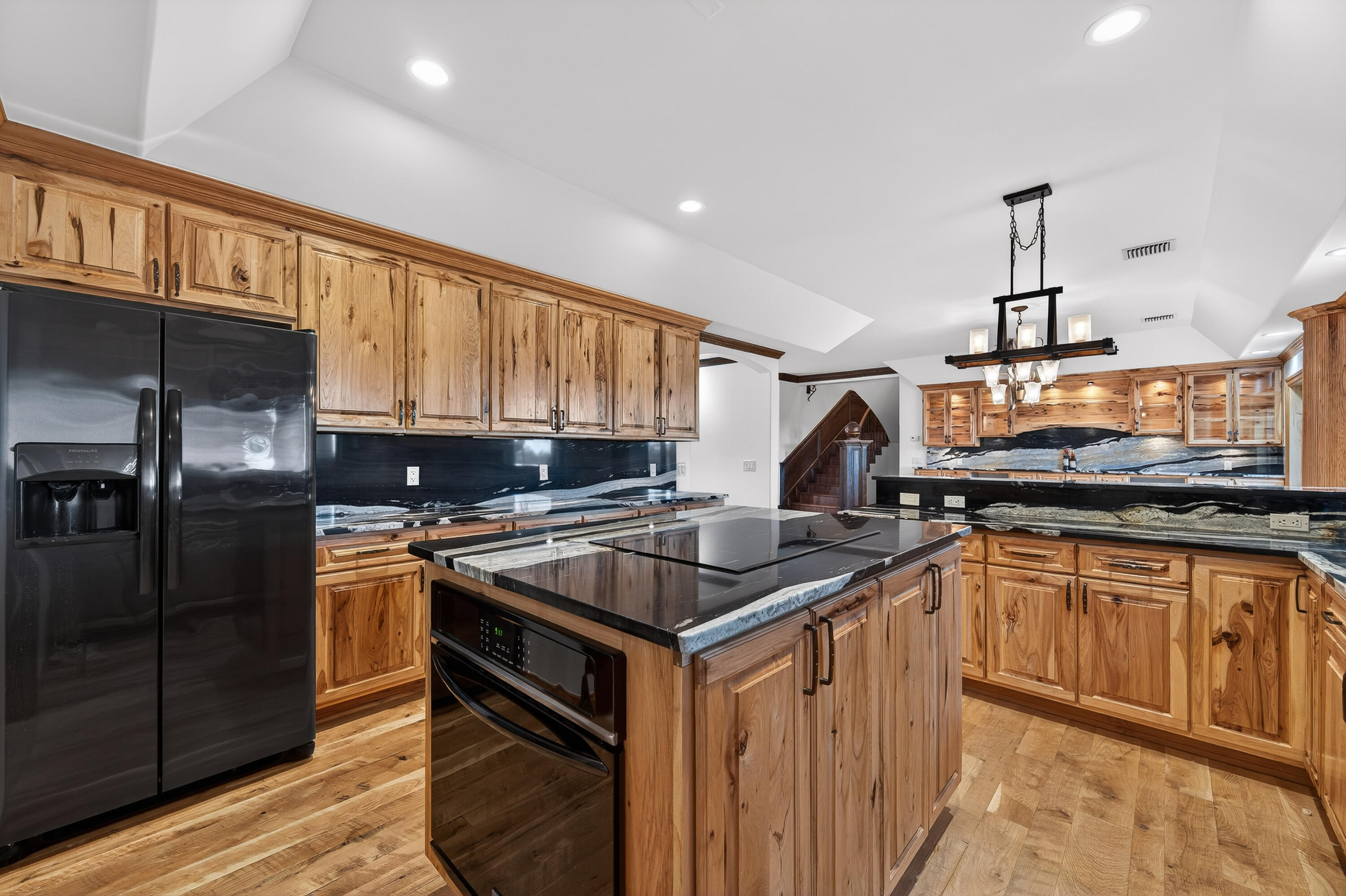 200 South Graves Road Fort Pierce, FL 34945 - Photo 23 of 58 a kitchen with stainless steel appliances granite countertop a sink a stove and a refrigerator